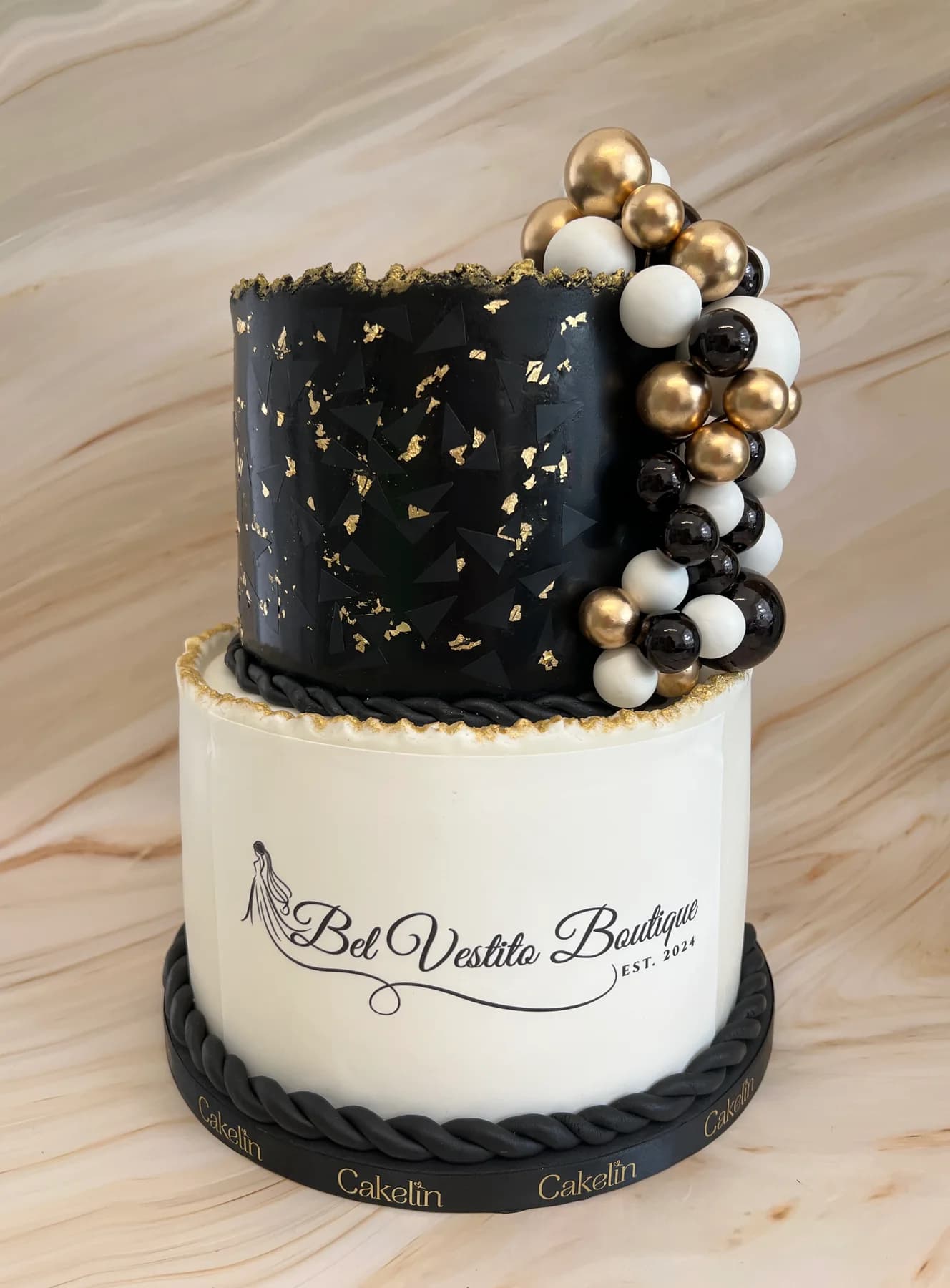 Modern black, white and gold tiered Cakelin cake