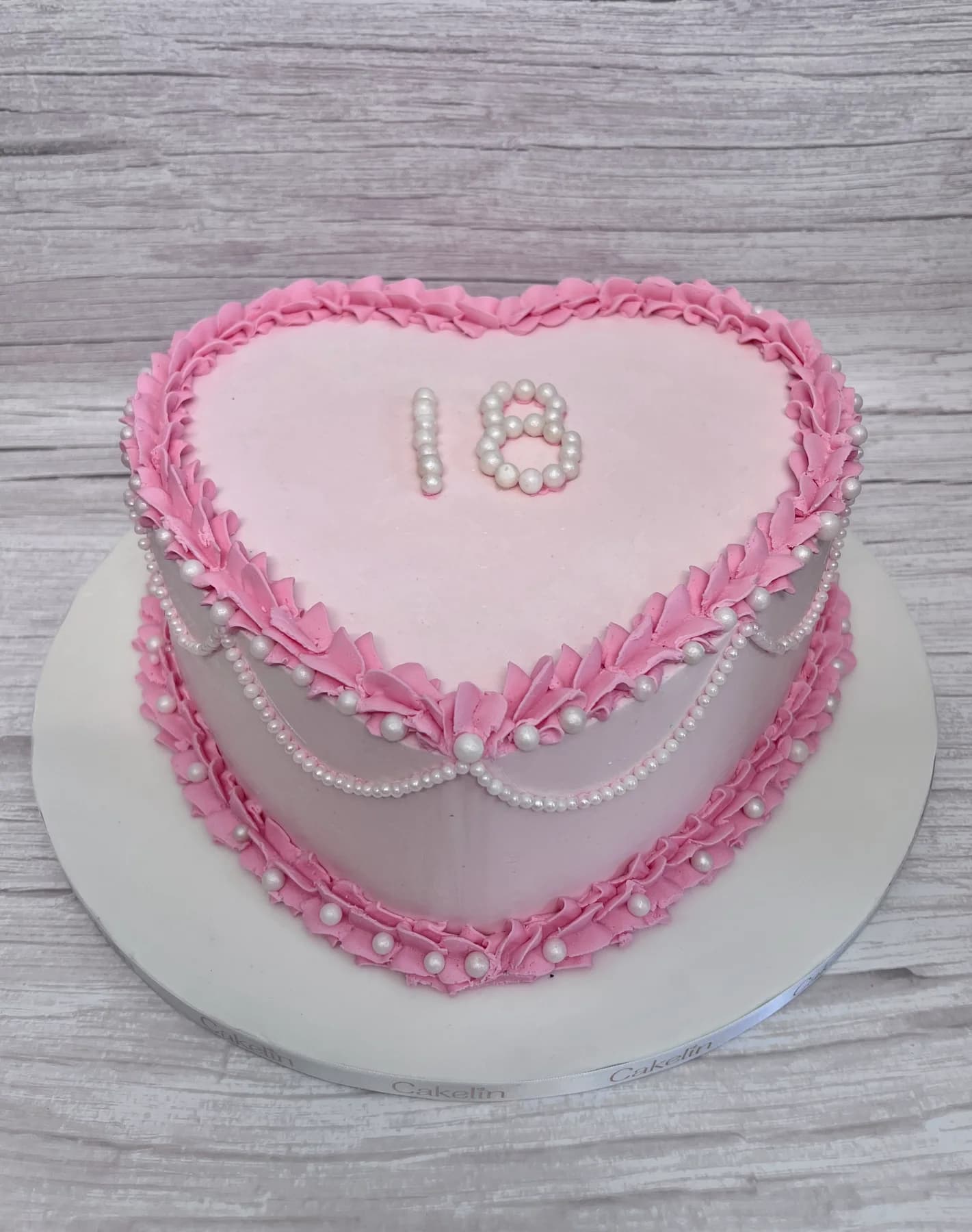 Heart-shaped eighteenth birthday cake