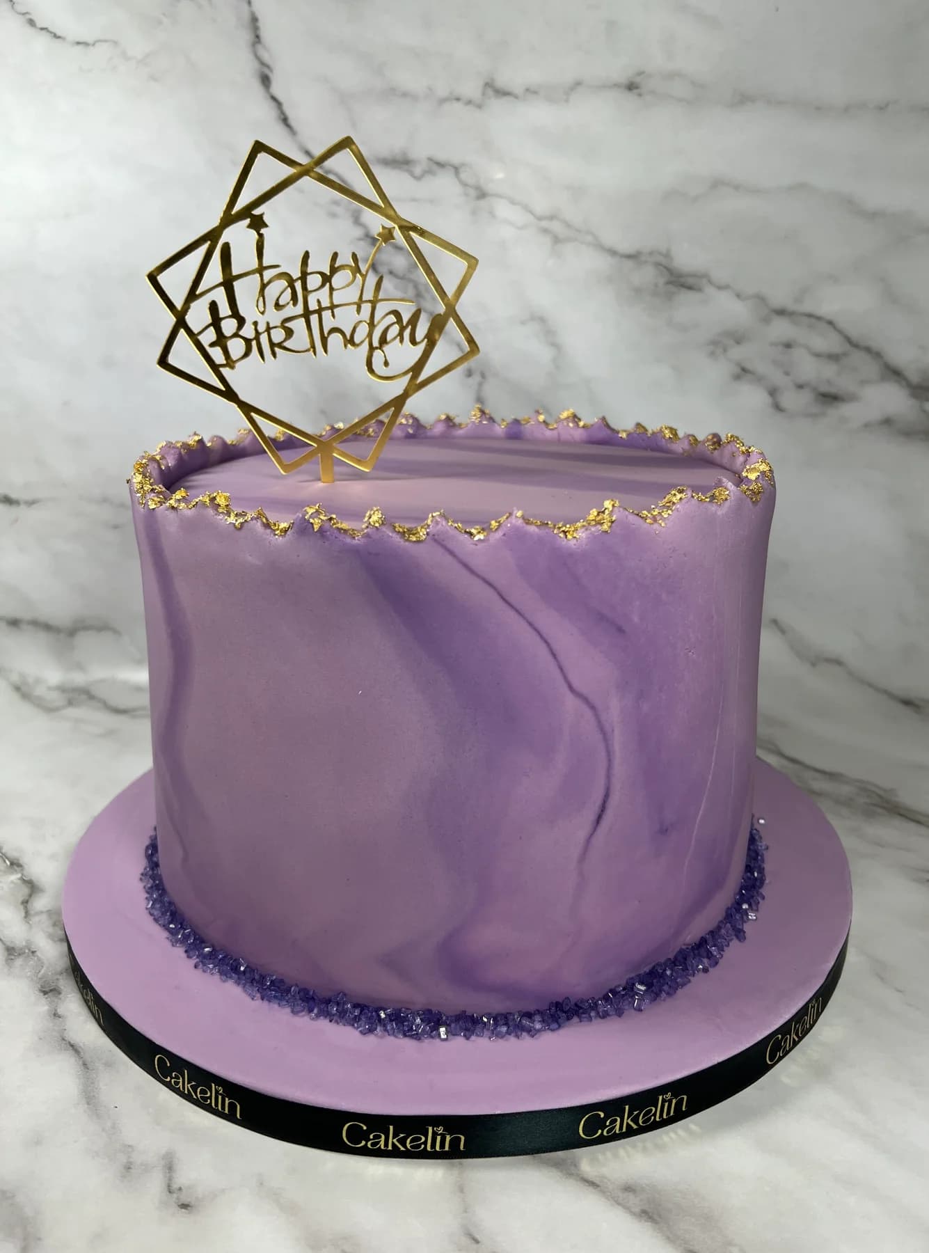 Purple floral birthday cake